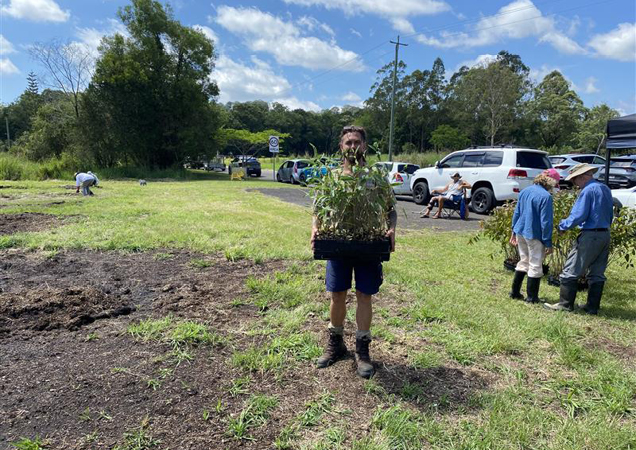 RSPCA Wildlife team member with some of the trees to be planted.